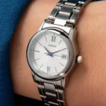 ساعة كاسيو LTP-V002D-7B3UDF النسائية الفضية الكلاسيكية بميناء أبيض | Casio LTP-V002D-7B3UDF Women Silver Classic White Dial Stainless Steel Watch