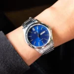 ساعة كاسيو MTP-1239D-2ADF الرجالية الكلاسيكية بميناء أزرق وعرض اليوم والتاريخ | Casio MTP-1239D-2ADF Men Blue Dial Day-Date Stainless Steel Watch